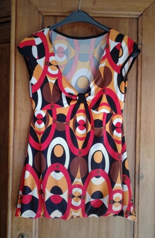 Top sans manches style vintage. Taille 36.