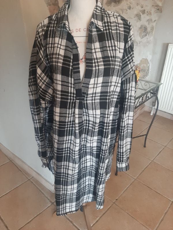 Chemise longueur 102 cm.