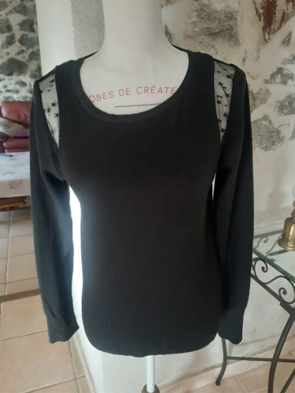 Pull longueur 56 cm.