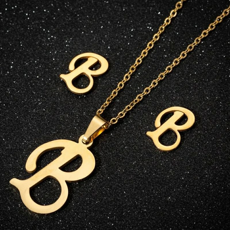 Parure "B" dorée en acier inoxydable