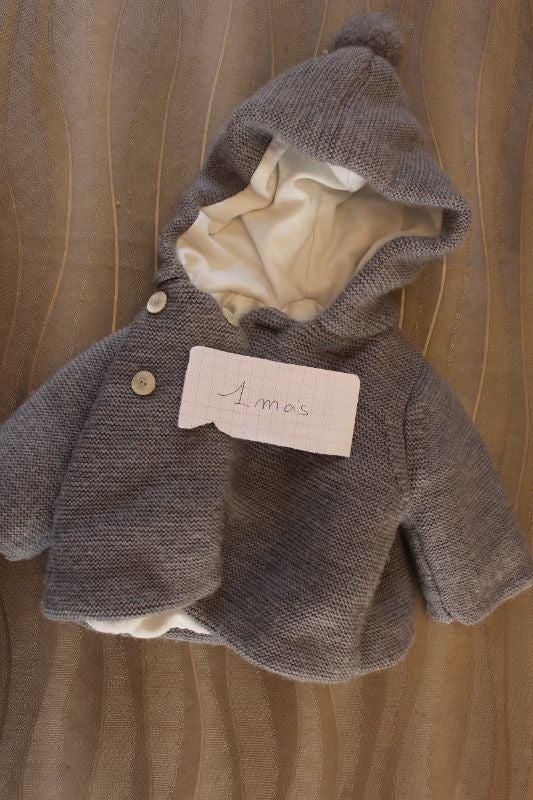 manteau/ gilet épais 1 mois
