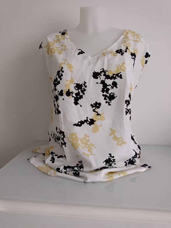 Tee shirt sans manches taille 38