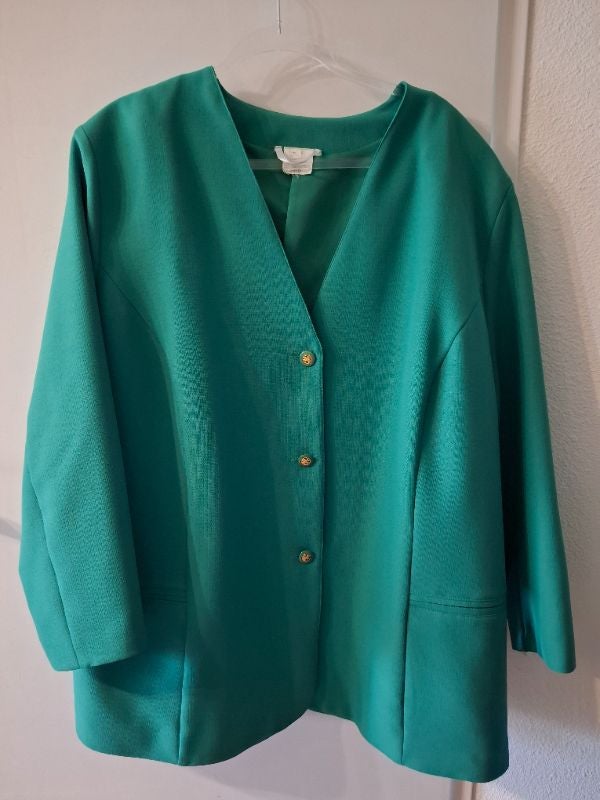 Blazer taille 52 en très bon état (mesure dans l'annonce)
