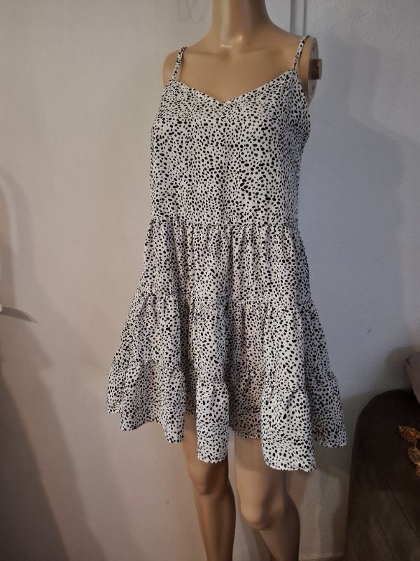 Robe bretelle taille 34 en très bon état